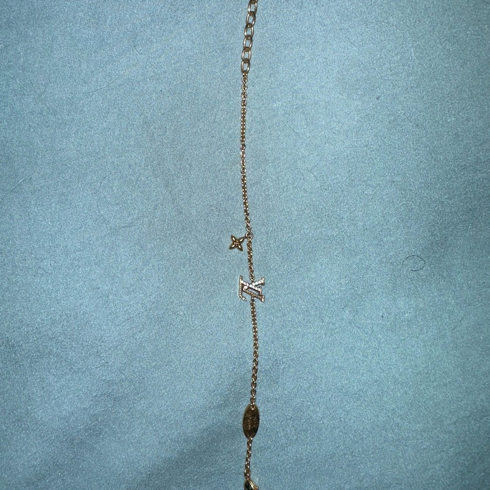 Louis Vuitton Gold Bracelet with Star and Initial Charm